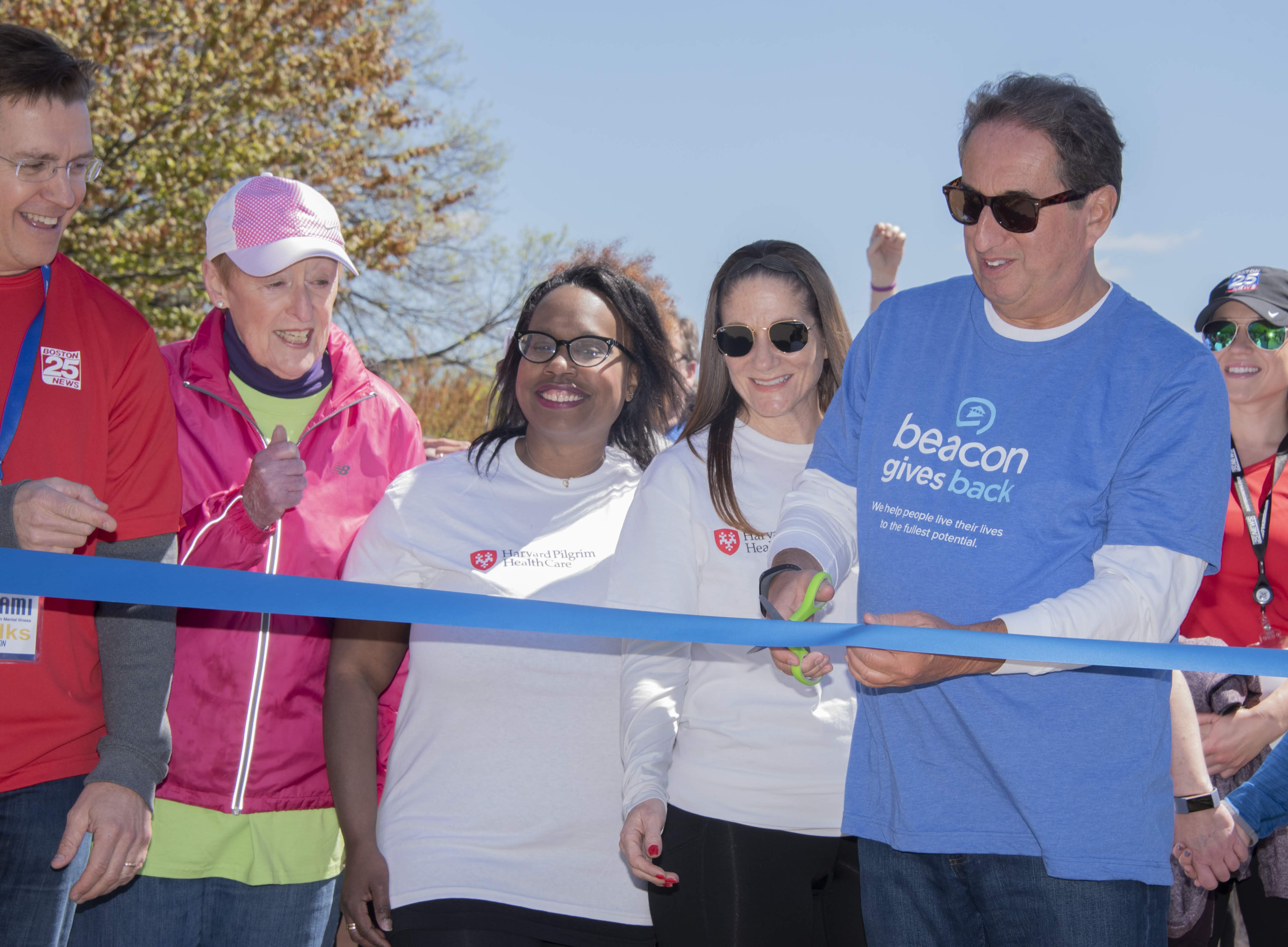 photo of people cutting the ribbon at the NAMIWalks Massachusetts start line